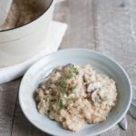 Easy Oven Risotto with Mushrooms | BourbonandHoney.com -- Creamy, cheesy and oh-so comforting, this Easy Oven Risotto with mushrooms is so quick to make that you can even serve it during the week!