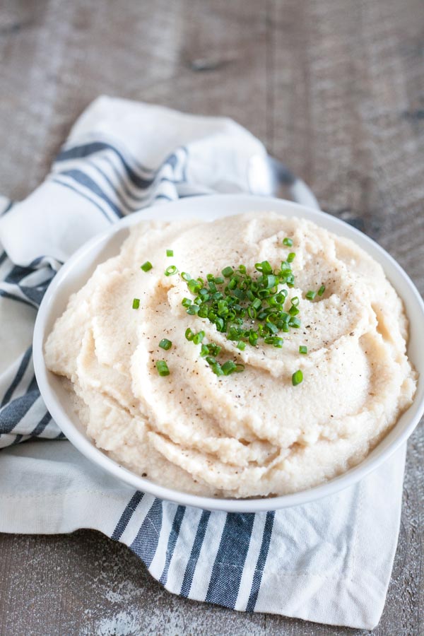 White Bean and Cauliflower Mash | BourbonandHoney.com -- Quick, easy and light, this White Bean and Cauliflower Mash is a deliciously healthy swap for traditional Mashed Potatoes!