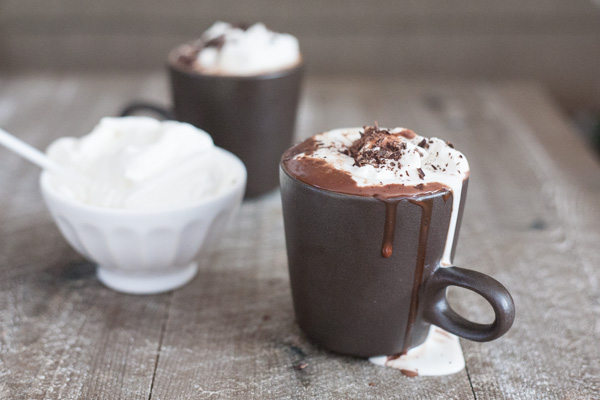 Bourbon Nutella Hot Chocolate with Bourbon and Honey Whipped Cream | BourbonandHoney.com -- Rich, chocolatey, spiked and delicious this Bourbon Nutella Hot Chocolate is topped with a Bourbon and Honey Whipped Cream and perfect for a cold night!