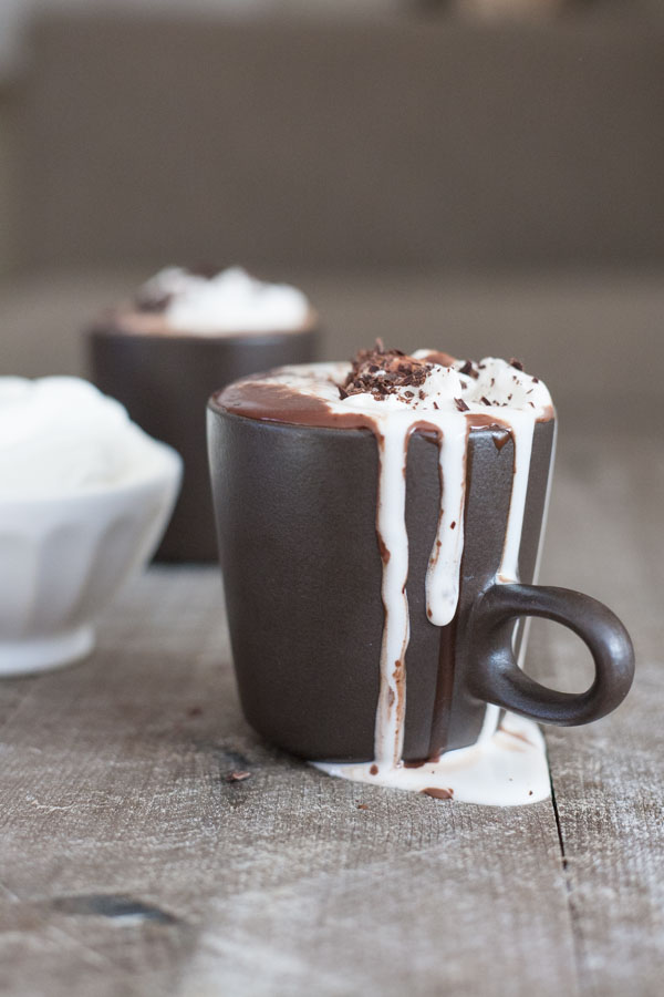 Bourbon Nutella Hot Chocolate with Bourbon and Honey Whipped Cream | BourbonandHoney.com -- Rich, chocolatey, spiked and delicious this Bourbon Nutella Hot Chocolate is topped with a Bourbon and Honey Whipped Cream and perfect for a cold night!