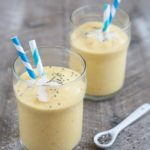 Coconut Mango Turmeric Smoothie | BourbonandHoney.com -- This Coconut Mango Turmeric Smoothie is packed with coconut, mango, banana and turmeric for a fruity snack or super healthy start to your day!