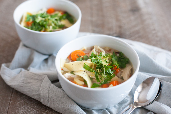 Hearty Slow Cooker Chicken Noodle Soup | BourbonandHoney.com -- Comforting, easy and hearty this Slow Cooker Chicken Noodle Soup is just the thing for when you're feeling crummy or needing to keep warm on a chilly winter day.