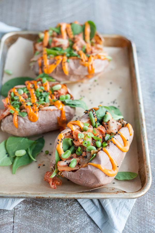 Kimchi Stuffed Baked Sweet Potatoes | BourbonandHoney.com -- These simple Spicy Kimchi Stuffed Baked Sweet Potatoes are a fun and flavorful veggie packed dinner or desk lunch recipe!