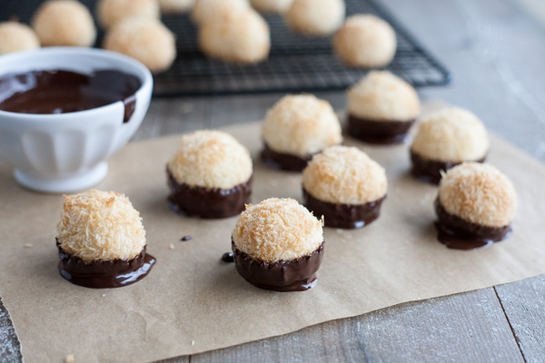 Easy Chocolate Dipped Coconut Macaroons | BourbonandHoney.com -- With double the coconut, these dark chocolate dipped coconut macaroons have a deliciously chewy inside and crispy outside for the perfect sweet treat!