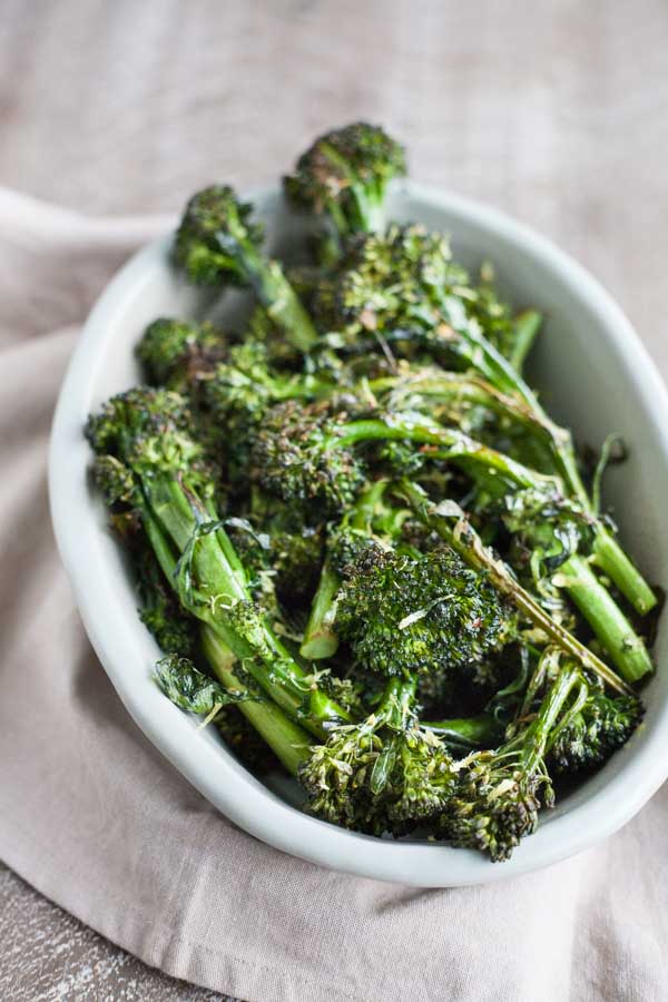 Easy Roasted Broccolini | BourbonandHoney.com -- This easy Roasted Broccolini is a super simple side dish recipe for weeknight dinners, brown bag lunches or snacking right from the sheet pan!