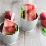 Bourbon and Honey Strawberry Mint Julep Popsicles | BourbonandHoney.com Square -- Frozen, boozy and super summery, these Bourbon and Honey spiked Strawberry Mint Julep Popsicles are going to be a keeper!