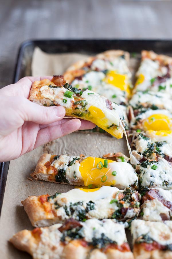 Bacon and Egg Burrata Breakfast Pizza | BourbonandHoney.com -- Start your morning right with this Bacon and Egg Burrata Breakfast Pizza recipe. It's cheesy, bacon-y and top with perfectly cooked eggs.