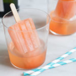 Boozy Aperol Spritz Popsicles | BourbonandHoney.com -- These slightly boozy Aperol Spritz Popsicles are the perfect recipe to cool down during the heat of summer, especially when served with a splash of Prosecco!