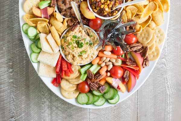 Southern Pimento Cheese Appetizer Tray | BourbonandHoney.com -- Packed with fruit, veggies, crackers and lot of cheese, this Southern Pimento Cheese Snack Tray is quick to make and can serve a crowd!