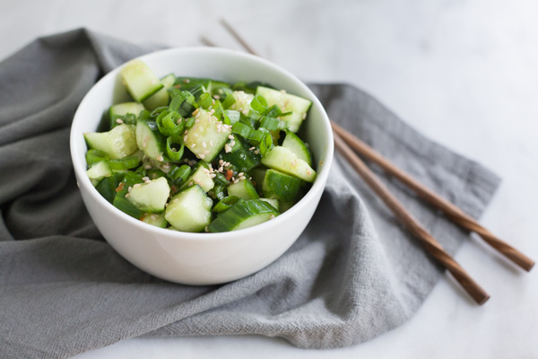 Easy Smashed Cucumber | BourbonandHoney.com -- This flavorful and super Easy Smashed Cucumbers recipe is a great way to use up all that summer bounty of garden veggies!