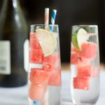Fresh Watermelon White Wine Spritzer | BourbonandHoney.com -- This simple, refreshing and low alcohol white wine spritzer is chilled with frozen watermelon for the perfect warm weather cocktail.