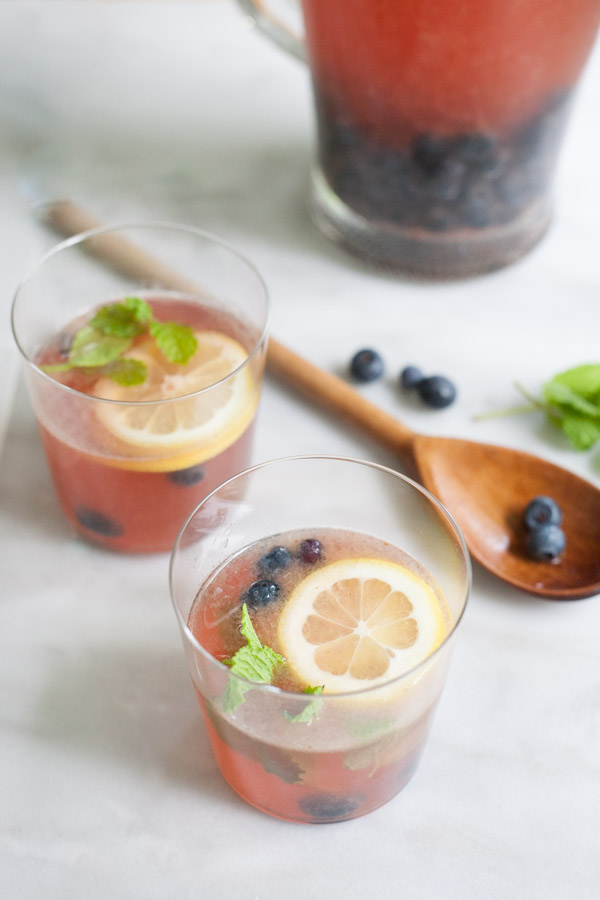 Bourbon and Honey Blueberry Smash Cocktail | BourbonandHoney.com -- Fresh, boozy and perfect for a crowd, this Bourbon and Honey Blueberry Smash Cocktail is ready for happy hour!